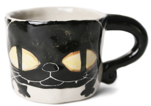 An eye catching feline takes the starring role on our Blue Witch Coraline ceramic collection.Each Espresso Cup is ingeniously hand illustrated by a prolific artist. The canny brush strokes and cunning design create a curiosity with an air of mystery. Each piece is hand tooled to form a slightly eccentric asymmetrical shape. Visually and audibly theatrical whilst great for everyday use, dishwasher safe and microwave friendly to guarantee the colour will never fade.  It will also add a magical charm to a dinner party. Guaranteed to make the kids ‘Meow’ with delight and full of joie de vivre at any fun theme party!