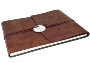 A very intelligent collection: The Romano Guest Book is supremely refined and redefined with natural recycled leather, specially created by professional Italian leather craftsmen. Employing advanced techniques, the environmental impact is much reduced. By using what is essentially a waste material it retains many of the properties and textures of regular leather without losing that wonderful natural leather smell. Uncompromised quality which is distinctive and is still a luxurious option. The leather has a glossy finish whilst still allowing for flexibility.