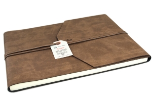 Specially developed with Italian expertise for LEATHERKIND ®. The Viaggio Guest Book is the result of ingenious effort. Handmade in Florence using natural recycled leather to create a more rugged natural finish whilst enhancing the tactile feel of the rustic leather.The leather itself has a wonderful oil skin-like matte texture which still allows for flexibility. Our recycled leather has a lesser impact on the environment and makes use of what is normally a waste product whilst retaining the integrity of genuine leather. The authority delivered by the perfect envelope wrap style offers a smart appeal.  Our Viaggio will blissfully enshrine your life full of memories.