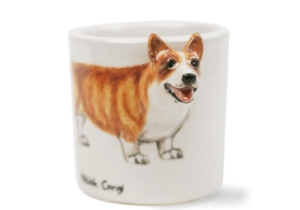 It is believed the Welsh Corgi is descended from Viking herding dogs. Known to be the pets of the English Monarchy they are said to make excellent companions. This lovely little dog is portrayed on a delectable ceramic by Blue Witch.