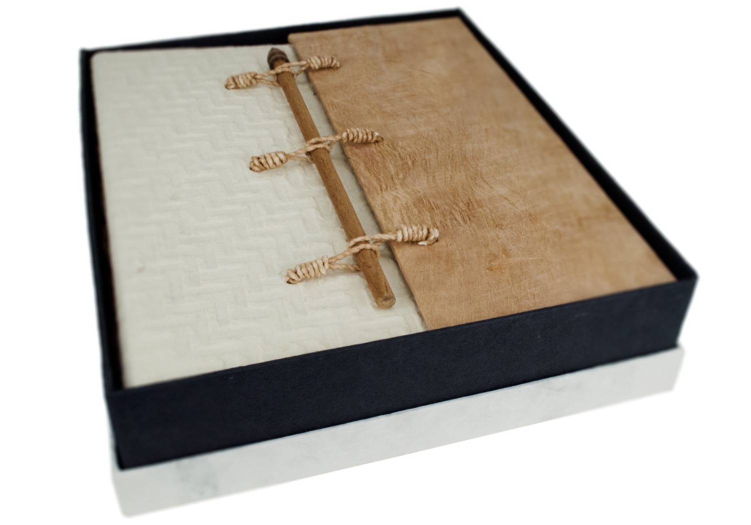 Achieve a little drama through sheer simplicity with our Oriental Photo Album. The design represents the Golden City’s Gate of Ancient Siam with a hand carved wooden post to open and close it.The super natural tree bark paper adds an uncluttered and calm aura creating a subtle and very timeless look. A contrasting natural bark half cover provides depth and sophistication. The gateway for all your happy memories which will be locked in and safe for future generations, the album itself is a lovely decorative piece for your home.