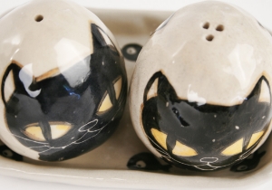 An eye catching feline takes the starring role on our Blue Witch Coraline ceramic collection.Each Cruet Set is ingeniously hand illustrated by a prolific artist. The canny brush strokes and cunning design create a curiosity with an air of mystery. Each piece is hand tooled to form a slightly eccentric asymmetrical shape. Visually and audibly theatrical whilst great for everyday use, dishwasher safe and microwave friendly to guarantee the colour will never fade.  It will also add a magical charm to a dinner party. Guaranteed to make the kids ‘Meow’ with delight and full of joie de vivre at any fun theme party!