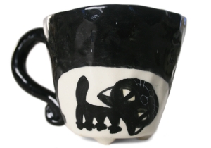 An eye catching feline takes the starring role on our Blue Witch Coraline ceramic collection.Each Espresso Cup is ingeniously hand illustrated by a prolific artist. The canny brush strokes and cunning design create a curiosity with an air of mystery. Each piece is hand tooled to form a slightly eccentric asymmetrical shape. Visually and audibly theatrical whilst great for everyday use, dishwasher safe and microwave friendly to guarantee the colour will never fade.  It will also add a magical charm to a dinner party. Guaranteed to make the kids ‘Meow’ with delight and full of joie de vivre at any fun theme party!