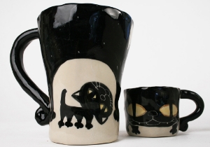 An eye catching feline takes the starring role on our Blue Witch Coraline ceramic collection.Each Coffee Mug is ingeniously hand illustrated by a prolific artist. The canny brush strokes and cunning design create a curiosity with an air of mystery. Each piece is hand tooled to form a slightly eccentric asymmetrical shape. Visually and audibly theatrical whilst great for everyday use, dishwasher safe and microwave friendly to guarantee the colour will never fade.  It will also add a magical charm to a dinner party. Guaranteed to make the kids ‘Meow’ with delight and full of joie de vivre at any fun theme party!