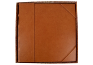 A declaration of unrivalled quality: the Sicilian Photo Album is an Italian Aristocratic design featuring intricate Tuscan craftsmanship. It is exquisitely handmade from the most exquisite and immaculate skins, known as full-grain leather hides.  This matchless leather is painstakingly tanned by Italian leather craftsmen using the world’s most environmentally friendly tanning method which utilizes vegetable dyes. This pioneering process can only be used on the finest hides as it does not disguise flaws but instead illuminates the leather’s natural lustrous grain.The robust structure is created using the adept art form of book binding and features a rigid ribbed arched spine. A sophisticated hand embossed design creates a stately impression and conveys an evocative warmth curtesy of the subtle tones of the leather.