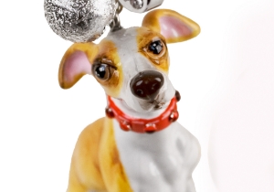 The sylph-like Whippet is, of course, famous for its incredible speed and is often seen racing around a track. This intelligent creature was originally a hunter of small game and comes from Great Britain. A beautiful ceramic from Blue Witch featuring this marvellous animal.