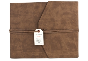 Specially developed with Italian expertise for LEATHERKIND ®. The Viaggio Guest Book is the result of ingenious effort. Handmade in Florence using natural recycled leather to create a more rugged natural finish whilst enhancing the tactile feel of the rustic leather.The leather itself has a wonderful oil skin-like matte texture which still allows for flexibility. Our recycled leather has a lesser impact on the environment and makes use of what is normally a waste product whilst retaining the integrity of genuine leather. The authority delivered by the perfect envelope wrap style offers a smart appeal.  Our Viaggio will blissfully enshrine your life full of memories.