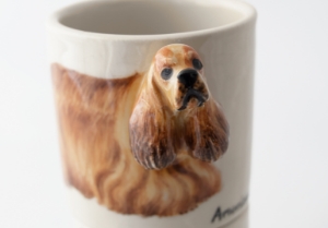 A gorgeous Blue Witch ceramic immortalising the stunning American Cocker Spaniel. A perfect family pet, this adorable breed is renowned for its affable personality.