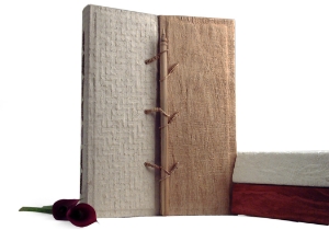 Achieve a little drama through sheer simplicity with our Oriental Photo Album. The design represents the Golden City’s Gate of Ancient Siam with a hand carved wooden post to open and close it.The super natural tree bark paper adds an uncluttered and calm aura creating a subtle and very timeless look. A contrasting natural bark half cover provides depth and sophistication. The gateway for all your happy memories which will be locked in and safe for future generations, the album itself is a lovely decorative piece for your home.