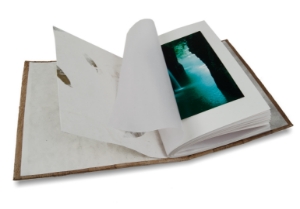 Achieve a little drama through sheer simplicity with our Oriental Photo Album. The design represents the Golden City’s Gate of Ancient Siam with a hand carved wooden post to open and close it.The super natural tree bark paper adds an uncluttered and calm aura creating a subtle and very timeless look. A contrasting natural bark half cover provides depth and sophistication. The gateway for all your happy memories which will be locked in and safe for future generations, the album itself is a lovely decorative piece for your home.