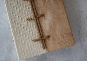 Achieve a little drama through sheer simplicity with our Oriental Photo Album. The design represents the Golden City’s Gate of Ancient Siam with a hand carved wooden post to open and close it.The super natural tree bark paper adds an uncluttered and calm aura creating a subtle and very timeless look. A contrasting natural bark half cover provides depth and sophistication. The gateway for all your happy memories which will be locked in and safe for future generations, the album itself is a lovely decorative piece for your home.