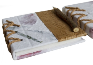 Once upon a time in a land far, far away, there were a beautiful bunch of Bougainvillea flowers. Their colourful petals brightly contrasted against the sky day after day…The seasons passed by and the beautiful petals eventually shrivelled and lost their hue.Meanwhile, there lived a skilled artisan from the foothills of Siam who mastered the art of preserving the unadorned beauty of the petals and used them to dress up the natural bark spine of a handmade cover and the Bougainvillea petals lived prettily ever after.